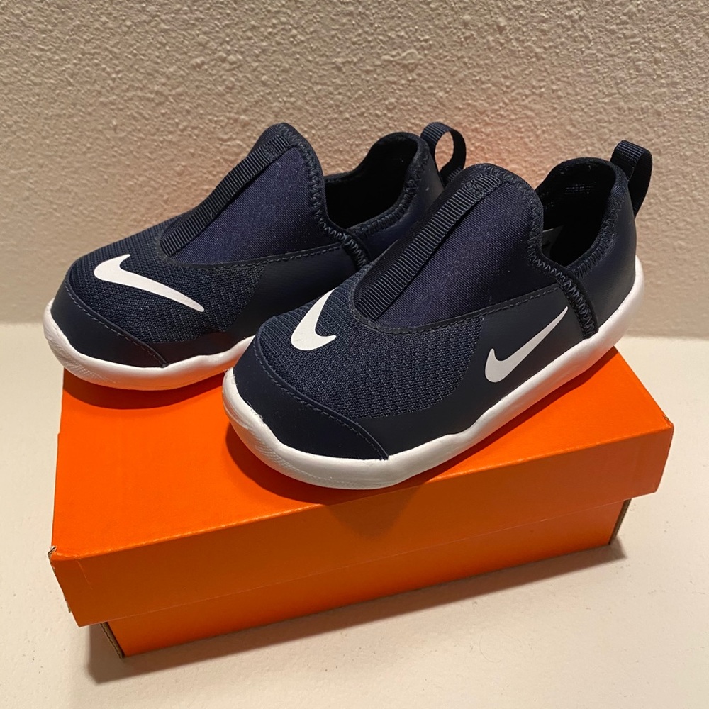 Nike lil swoosh